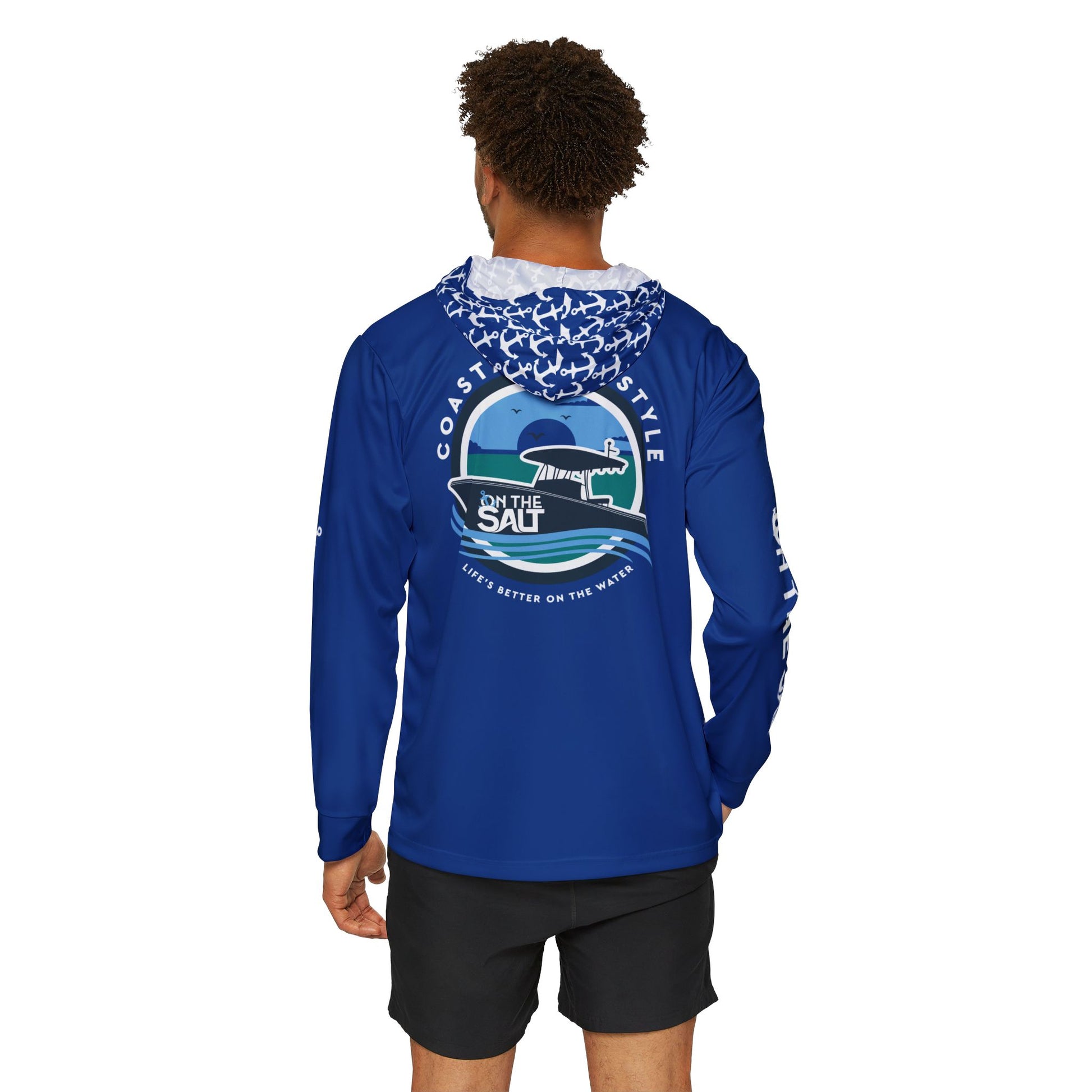Blue long-sleeve shirt with a logo on the back, worn by a person on a white background